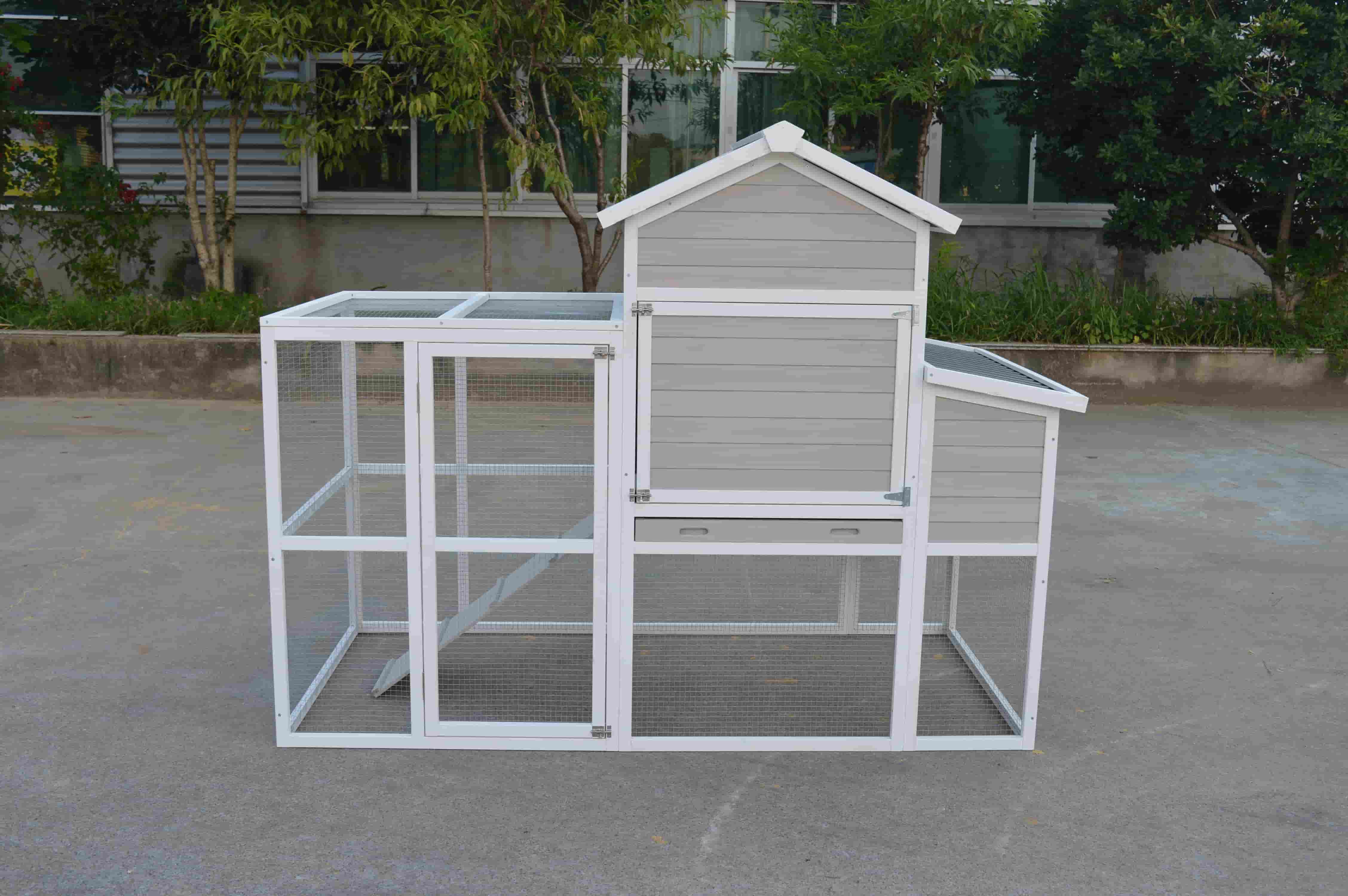 Chicken coop with pull-out metal cleaning tray and easy-open side egg nesting box, designed for effortless waste removal and convenient egg collection.